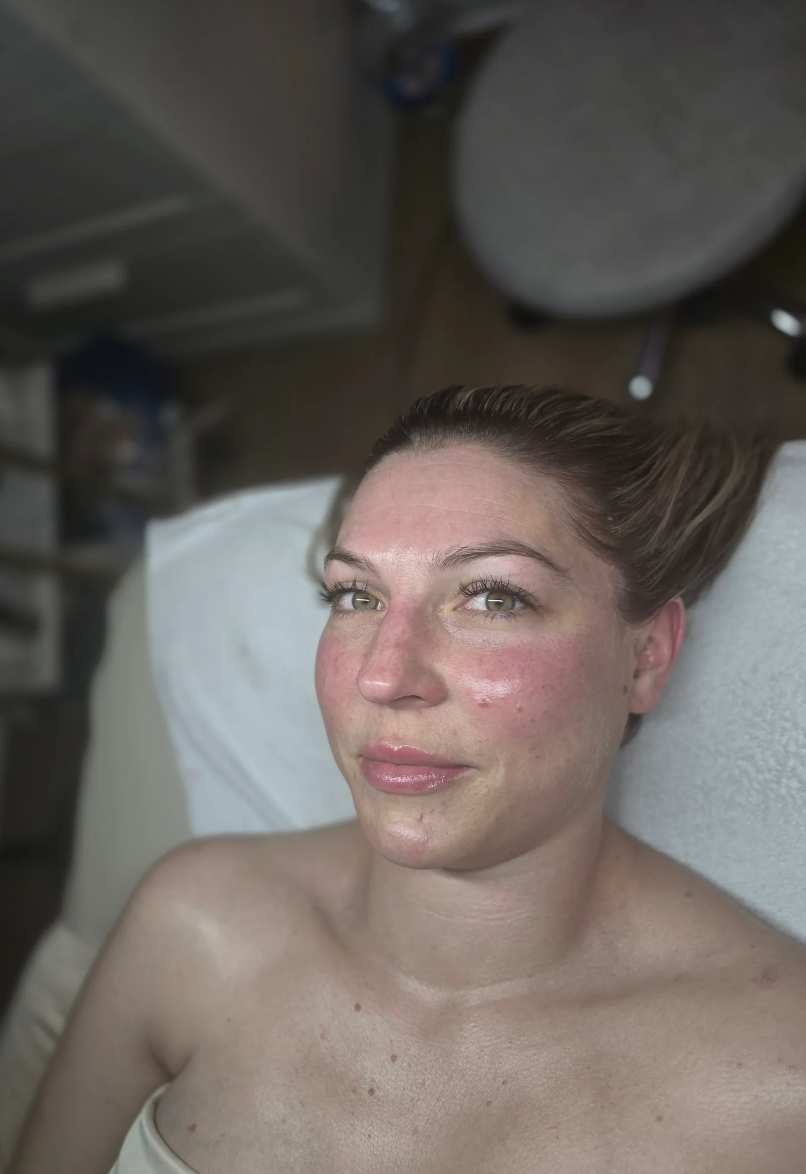 Client showing her fresh glow after a customized facial in Centerville, Ohio